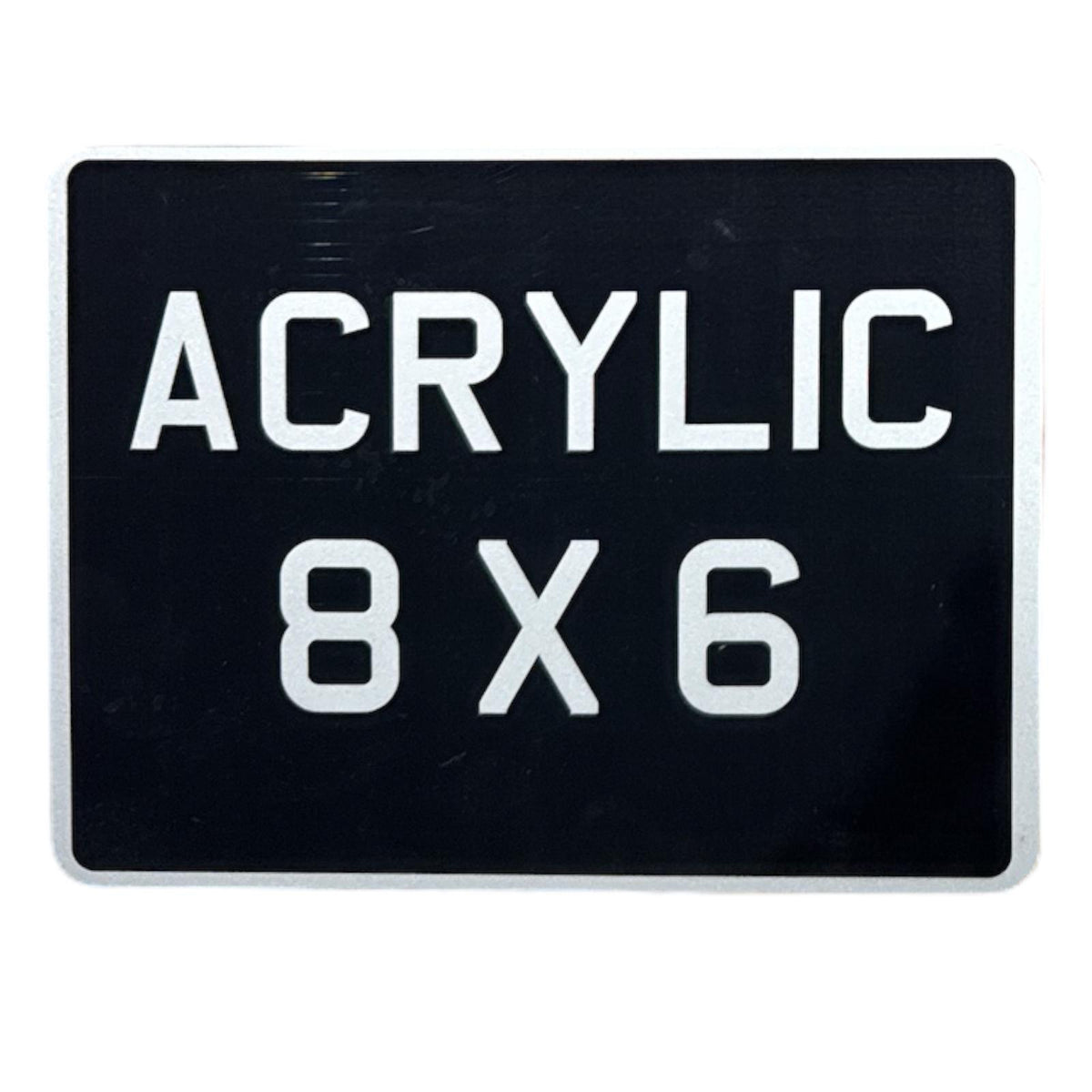 Black acrylic motorcycle number plate with white text stating 'ACRYLIC 8X6'.